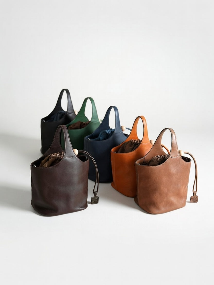 Hadiqa Bloom Lychee Leather Bucket Bag